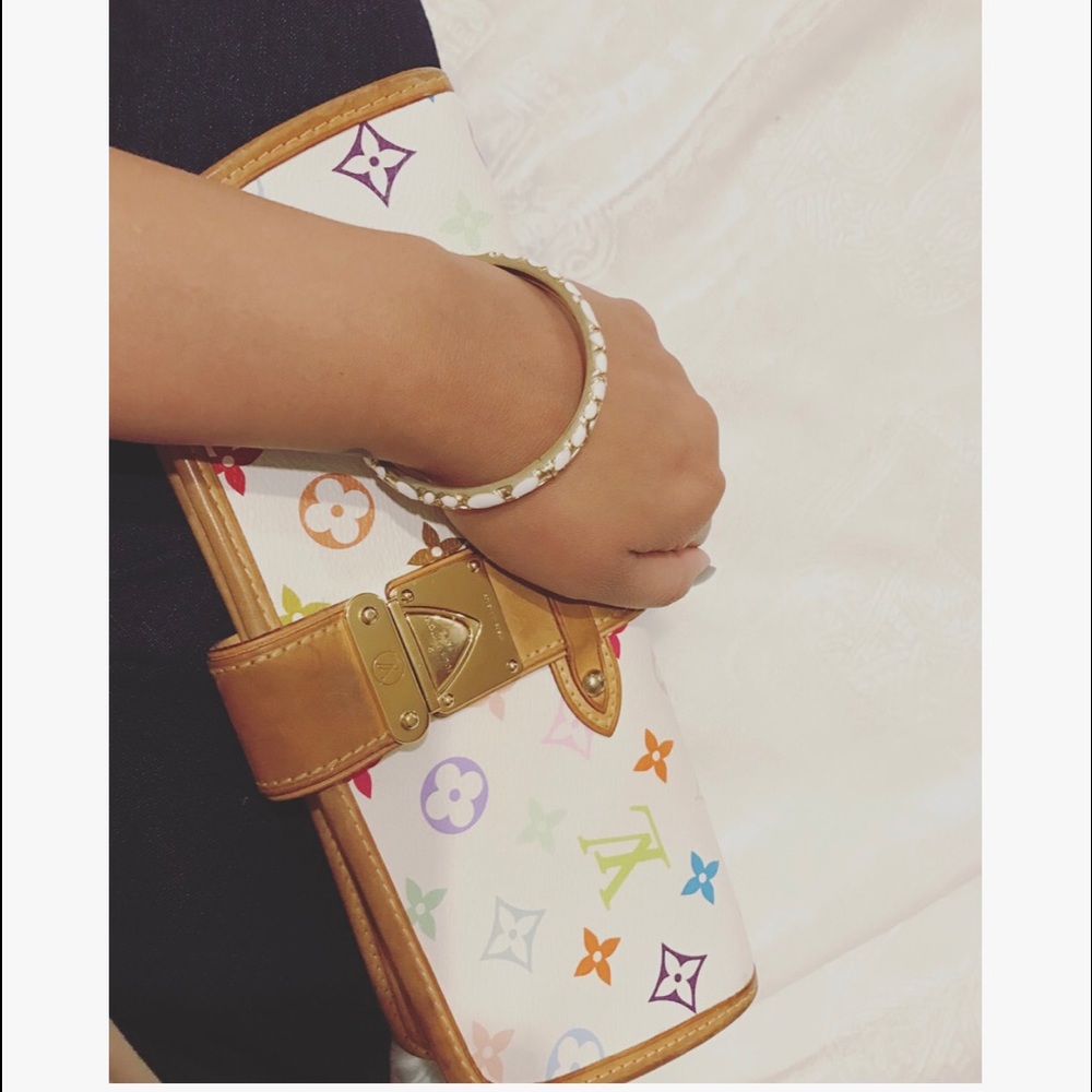 LV monogram clutch or body cross