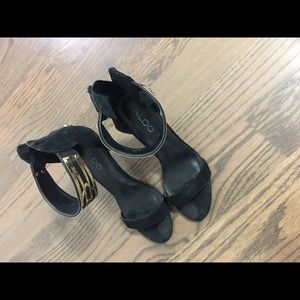 Black and gold sandals from Aldo