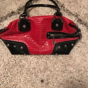 Kathy Van Zeeland red and black purse