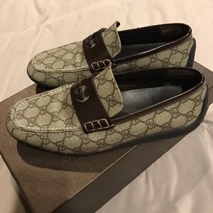 Authentic Men's Gucci Monogram shoes.