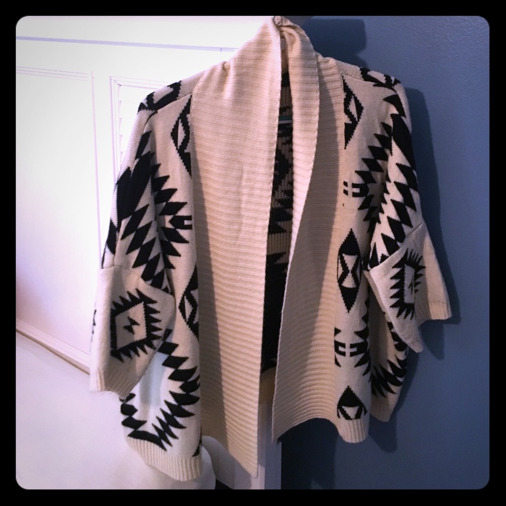 Beige and black sweater warm and stylish!