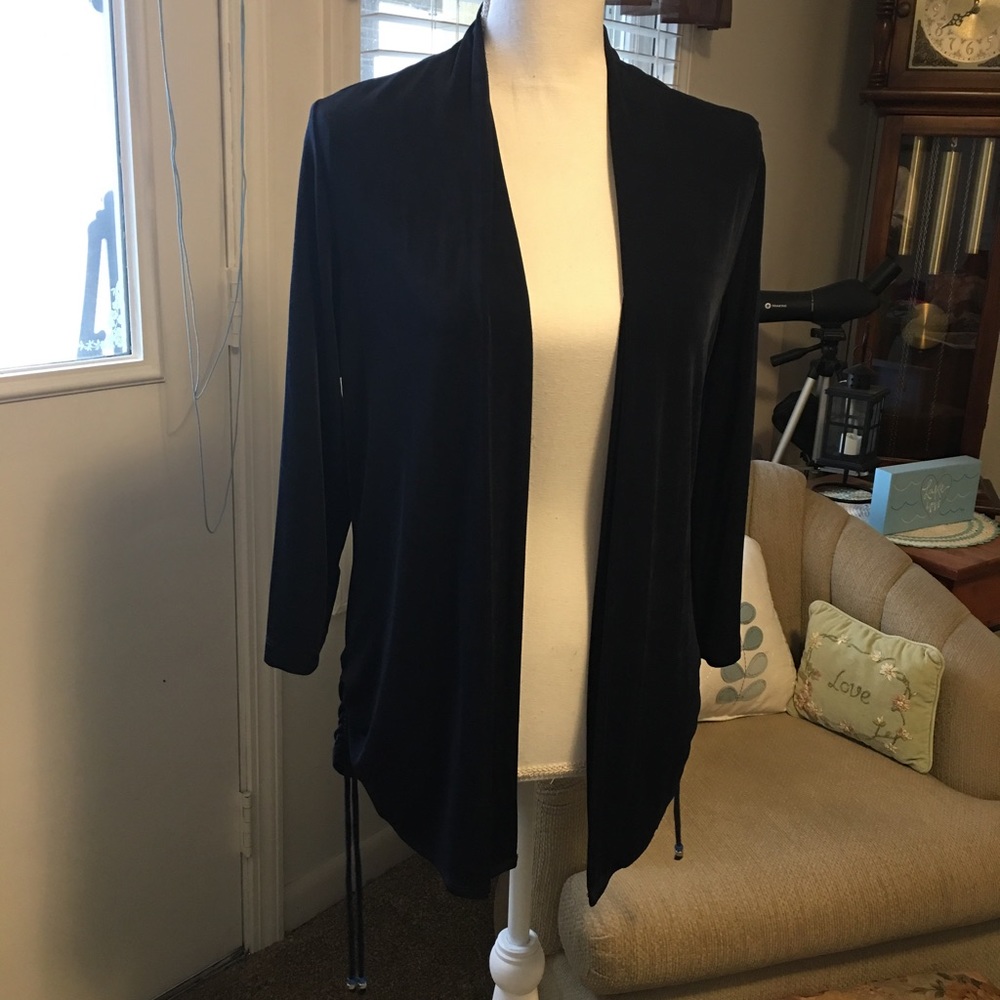 One size fits most. Navy blue and silky feel.