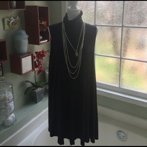 ASOS. Navy turtleneck sleeveless swing dress