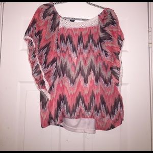 Fun flowing top with built in tank.