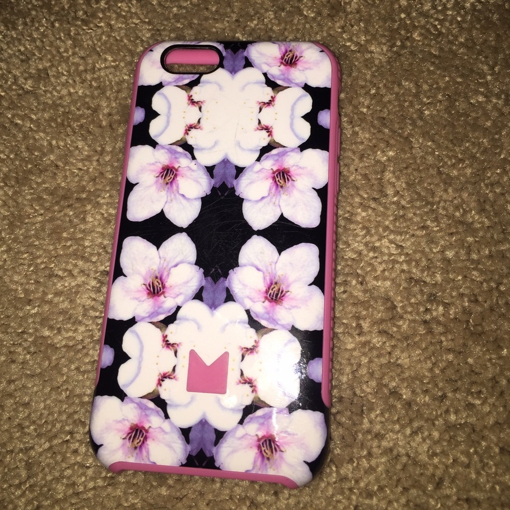 This is a black white and pink case for IPhone 6s