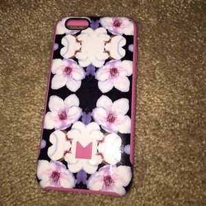 This is a black white and pink case for IPhone 6s