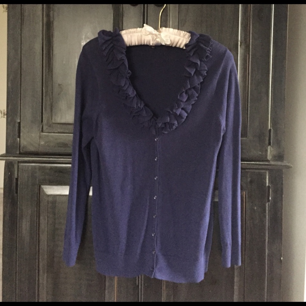 Deep violet cardigan sweater.