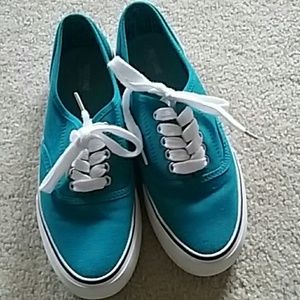 Teal colored sneakers