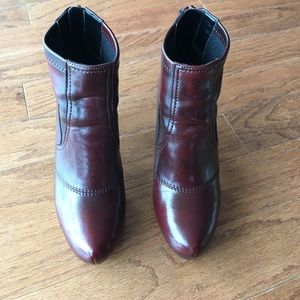 Franco Sarto Apache boots that zip up in back.