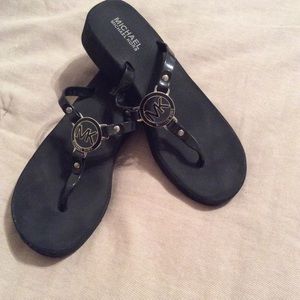 Michael Kors Flip Flops.