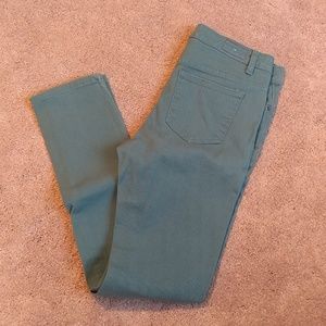 Adam Levine turquoise skinny jeans