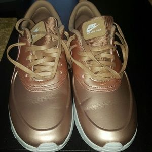 Nike Air Thea-Rosegold color.