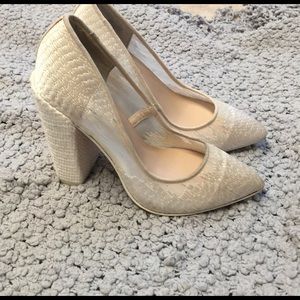 Aldo cream and taupe colored block heeled pumps.