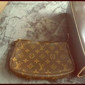 Authentic LV used as a make up bag