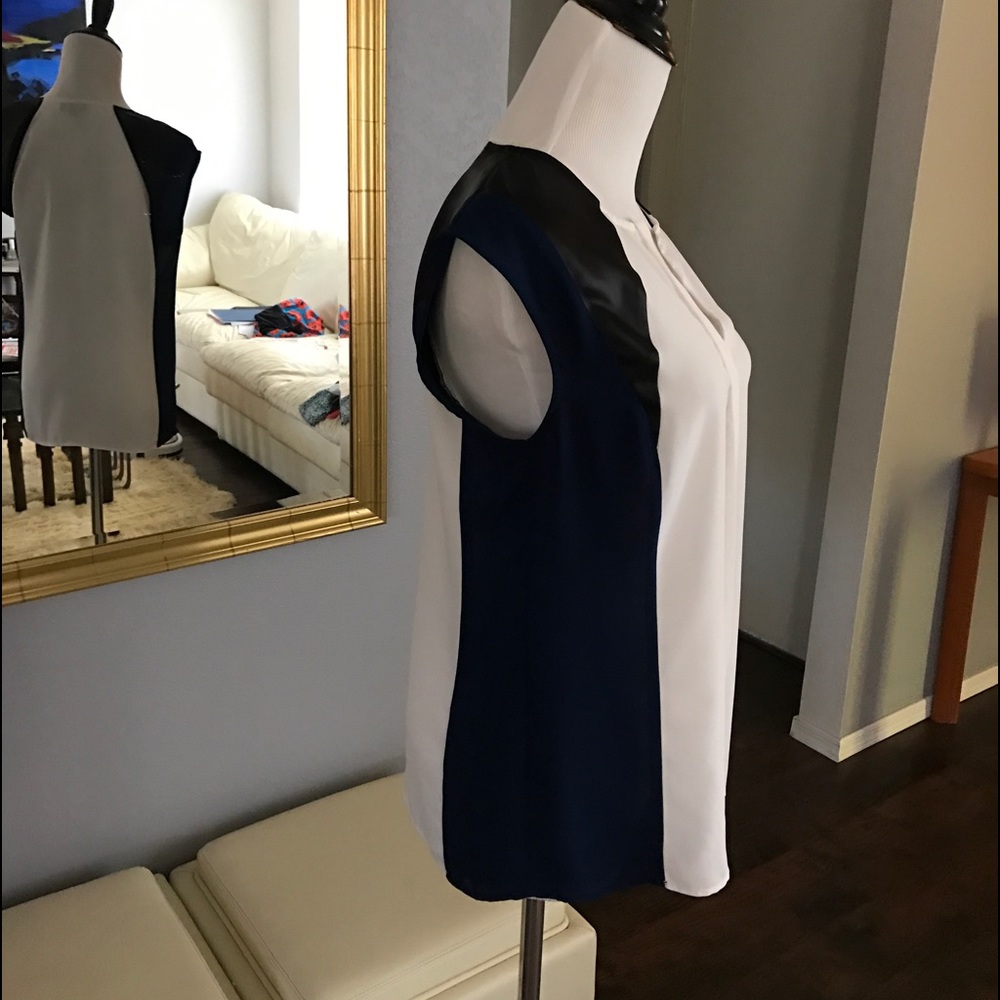 Faux leather sleeveless blouse