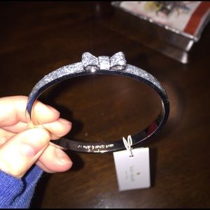 Kate Spade tied with a bow bangle bracelet