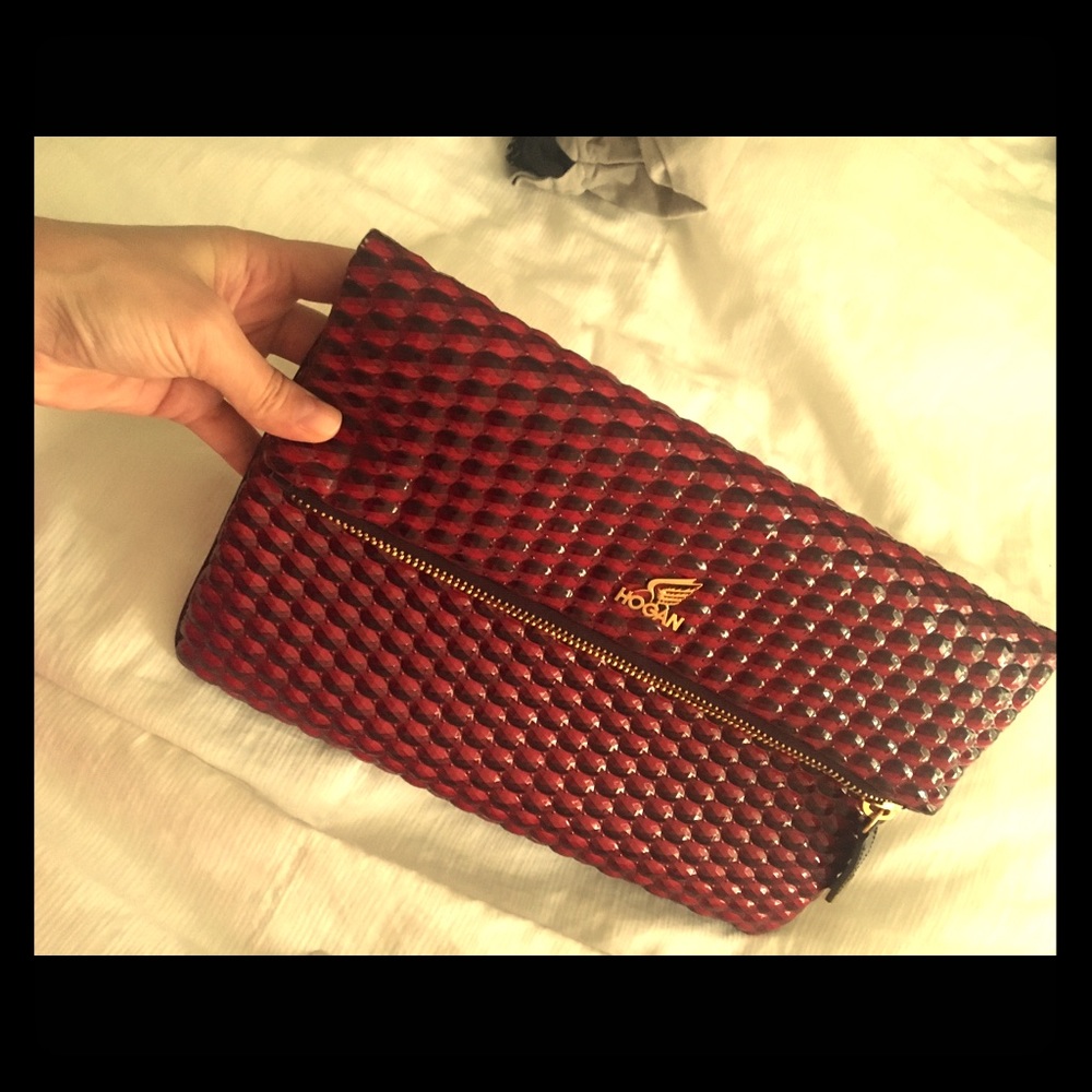 A red patent versatile cross body /clutch