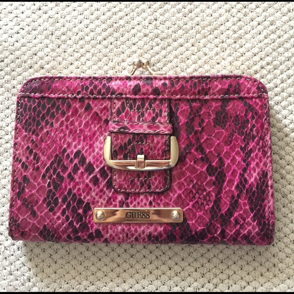 Brand new GUESS clutch. Snake print.