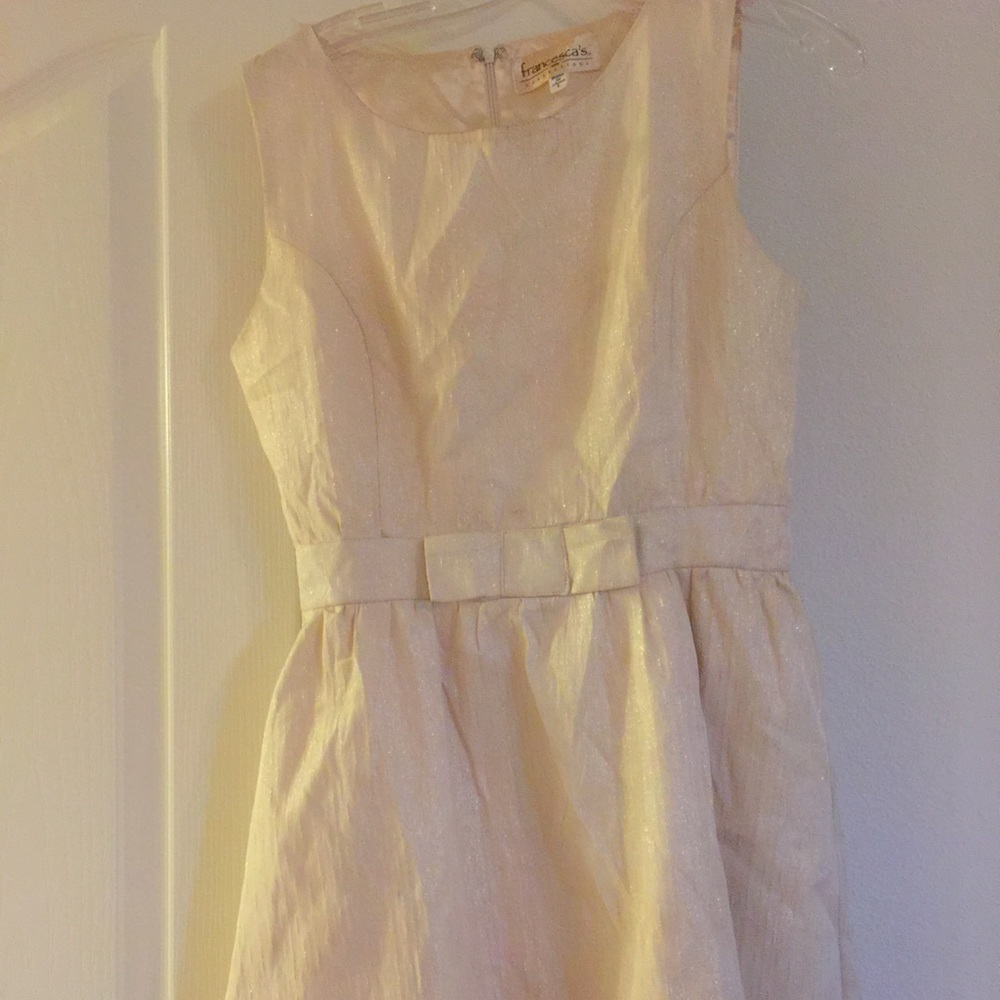 Shimmery cream dress with bow on waist