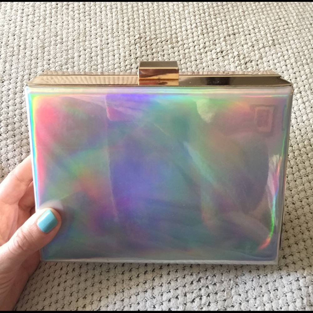 Brand new hologram effect clutch.