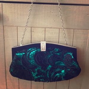 Emerald green and black lace clutch