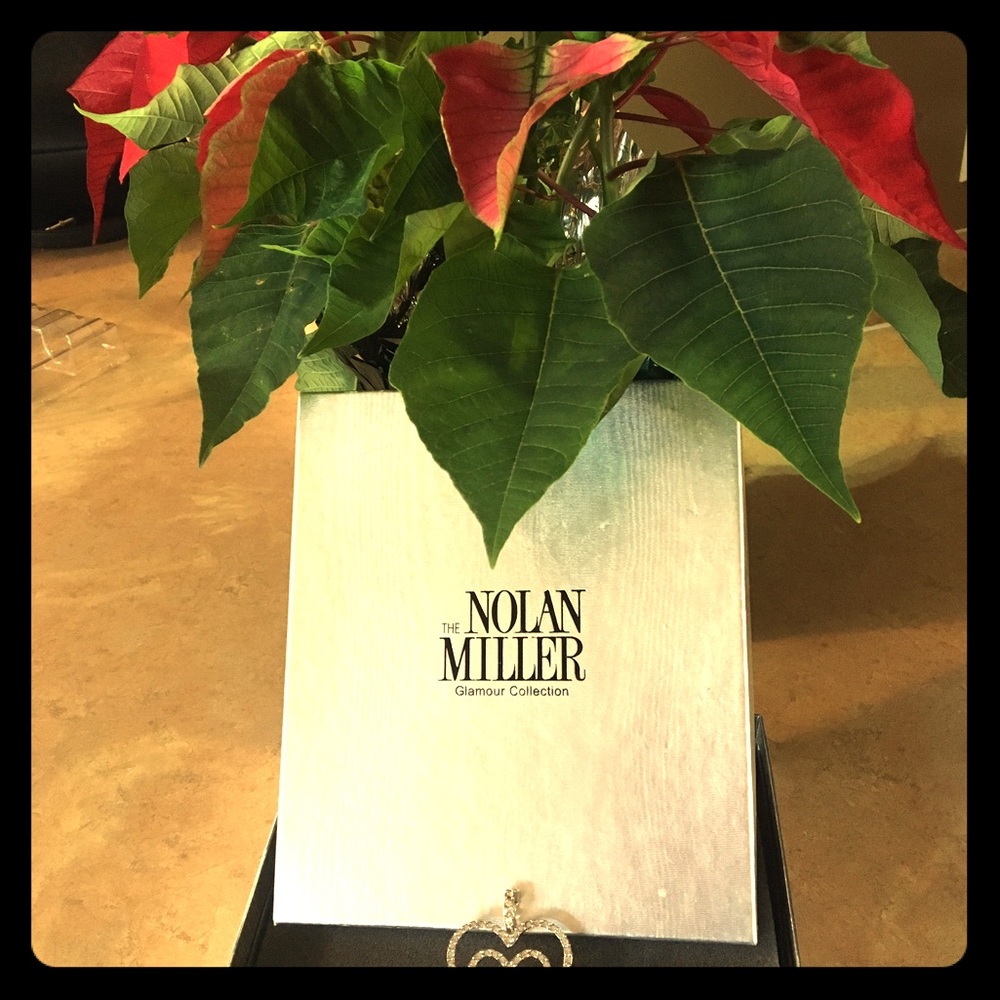 Nolan Miller's "gracious heart" pendant.