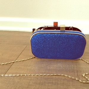 Small blue clutch