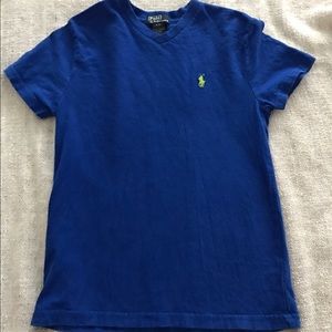 Short sleeve boys blue polo.