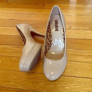Nude leather heels. Never worn before.