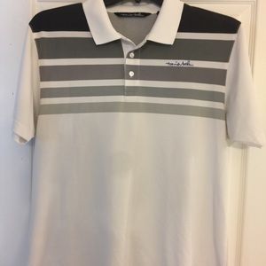 Travis Mathew golf shirt.