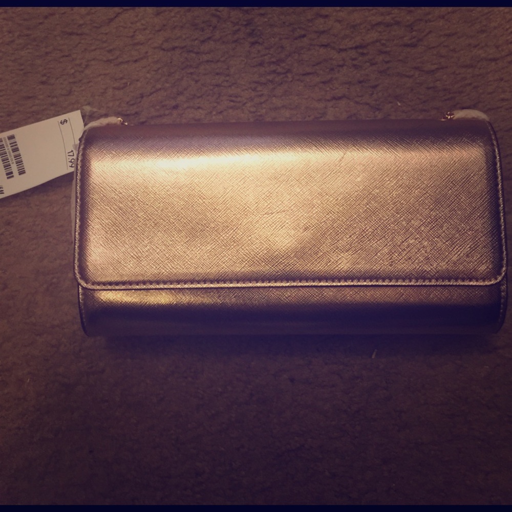Brand new gold clutch