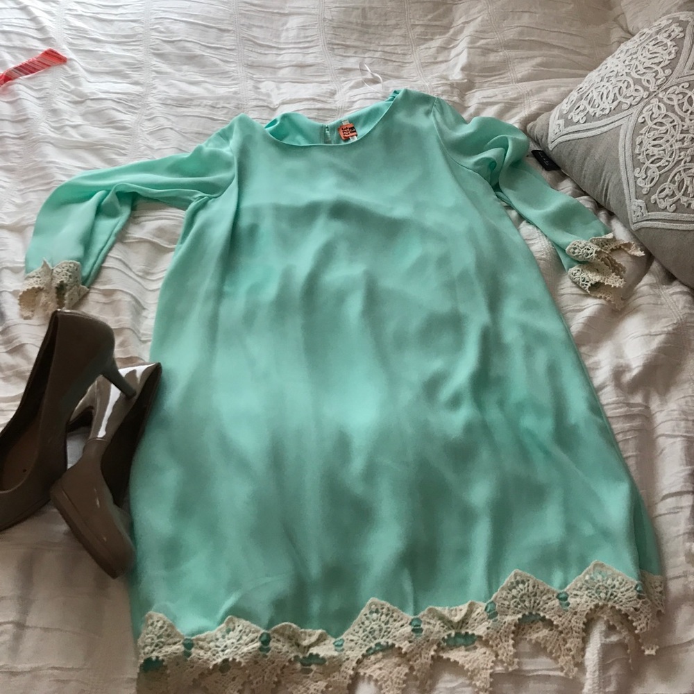 Light teal dress with lace detailing