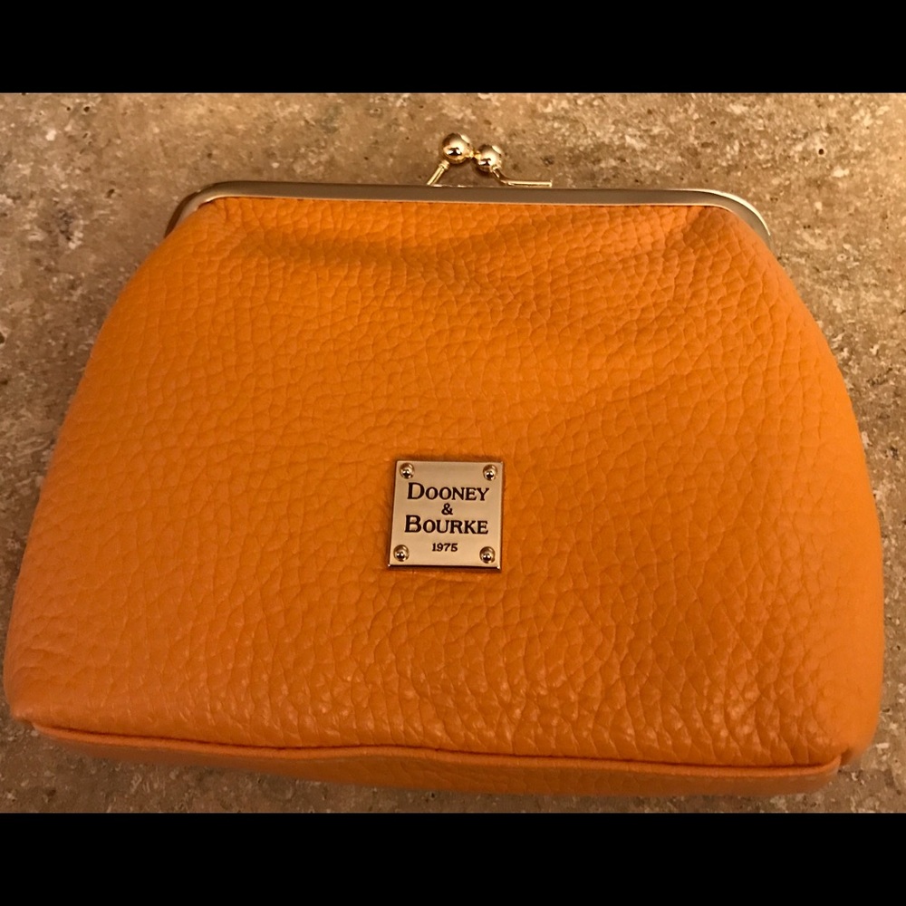 Dooney and Bourke kiss coin wallet.