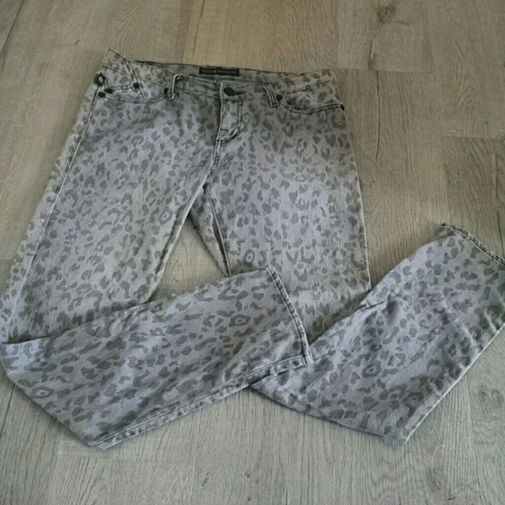 Gray leopard print skinny jeans.