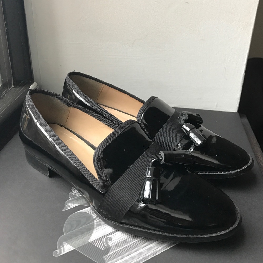 Patent leather black loafers with tassels. Zara