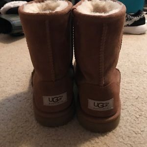 A pair of authentic, tan, ugg boots. They are tan