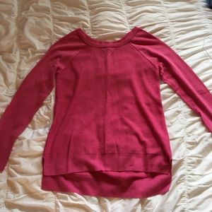 Loose and long bright pink sweater