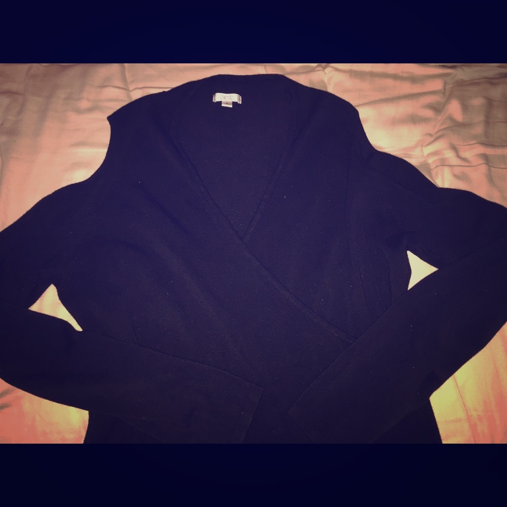 Black cache peep shoulder sweater