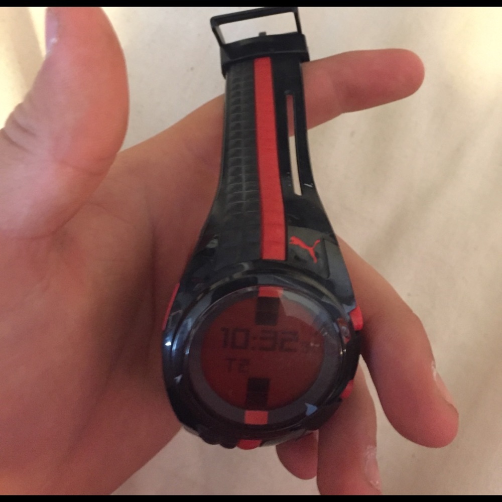 Red and black puma watch.