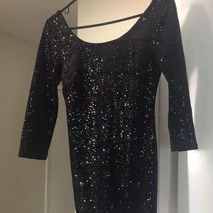 Super Stretchy Sequin Dress. Low cut back.