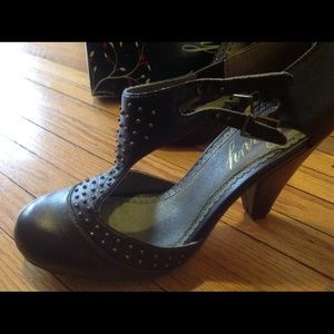 Hugs n Kisses studded low heel t-strap in brown.