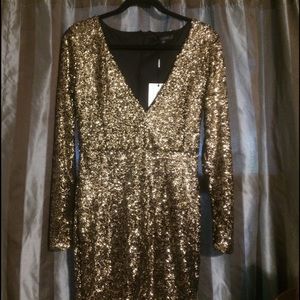 Black and gold sequin dress