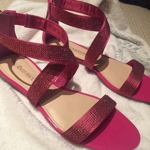 Dark pink sandals with rhinestones.