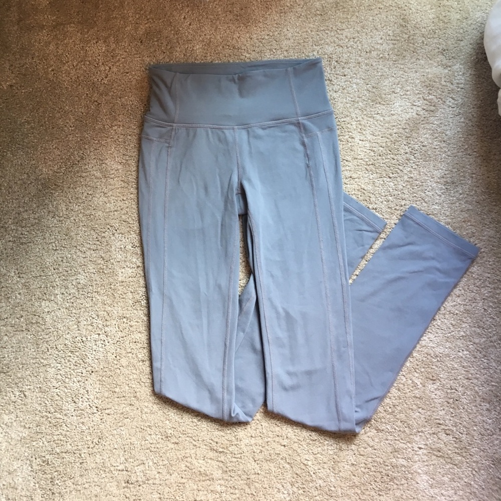Gray Athleta straight leg leggings.