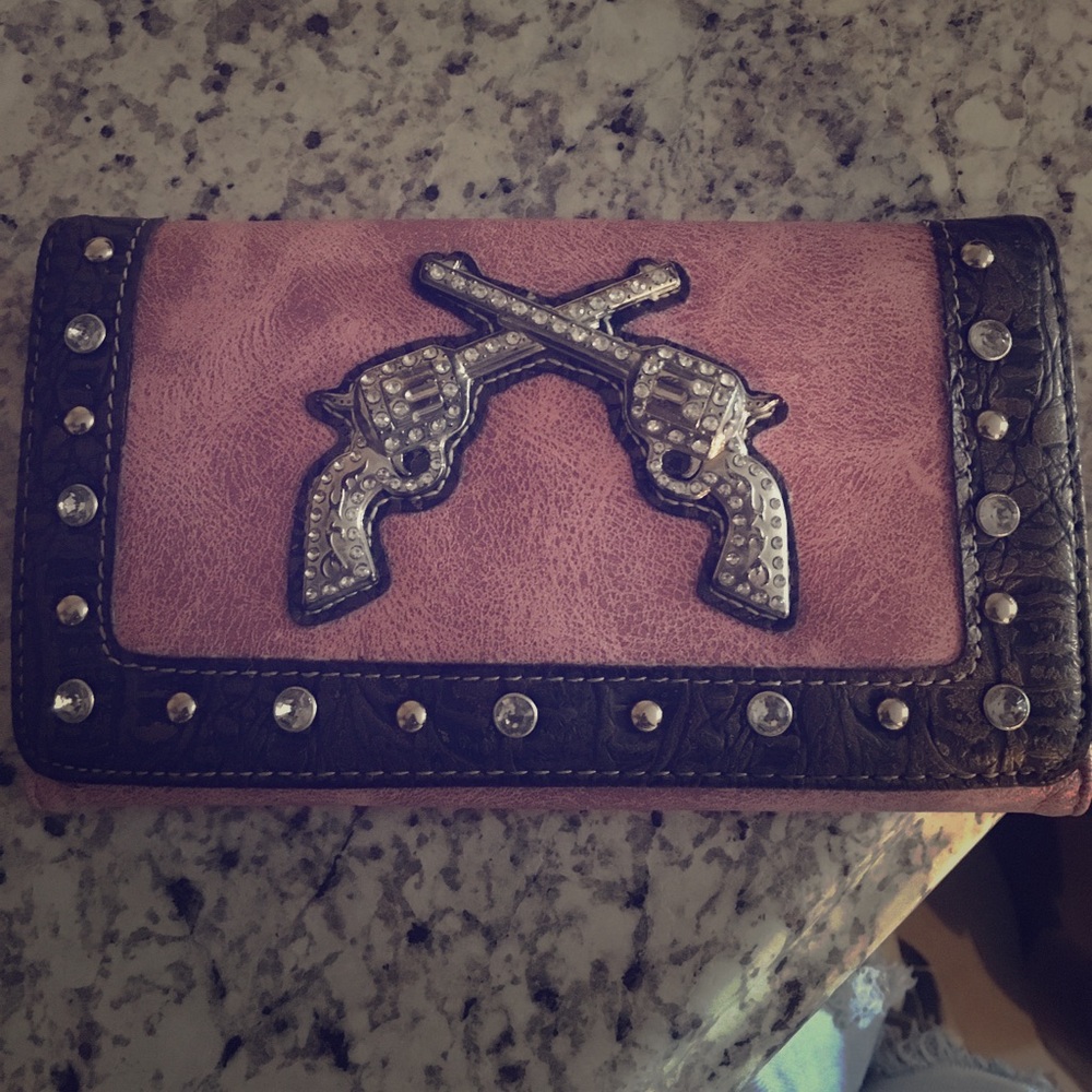 Rhinestone wallet with crossing revolvers
