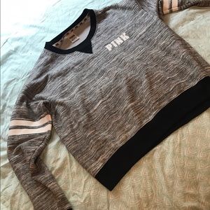 Pink brand sweatshirt. New condition. Grey