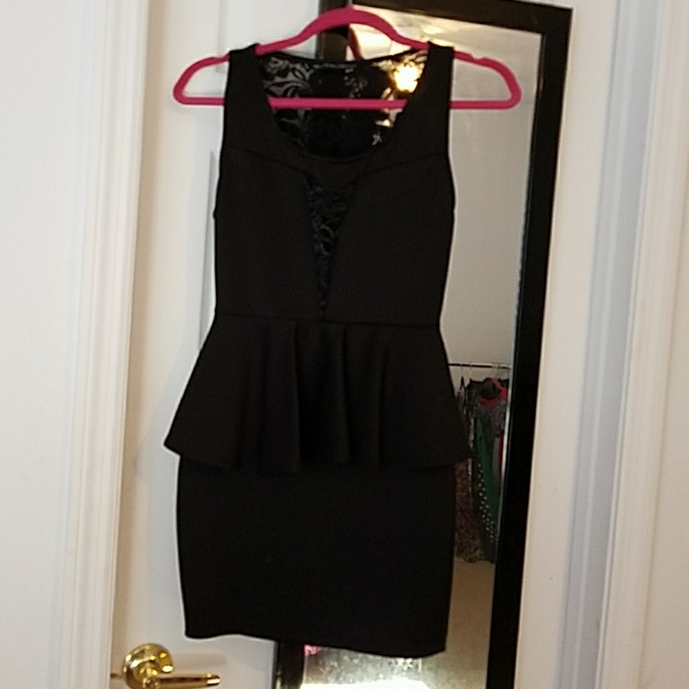 Black peplum LBD with lace back