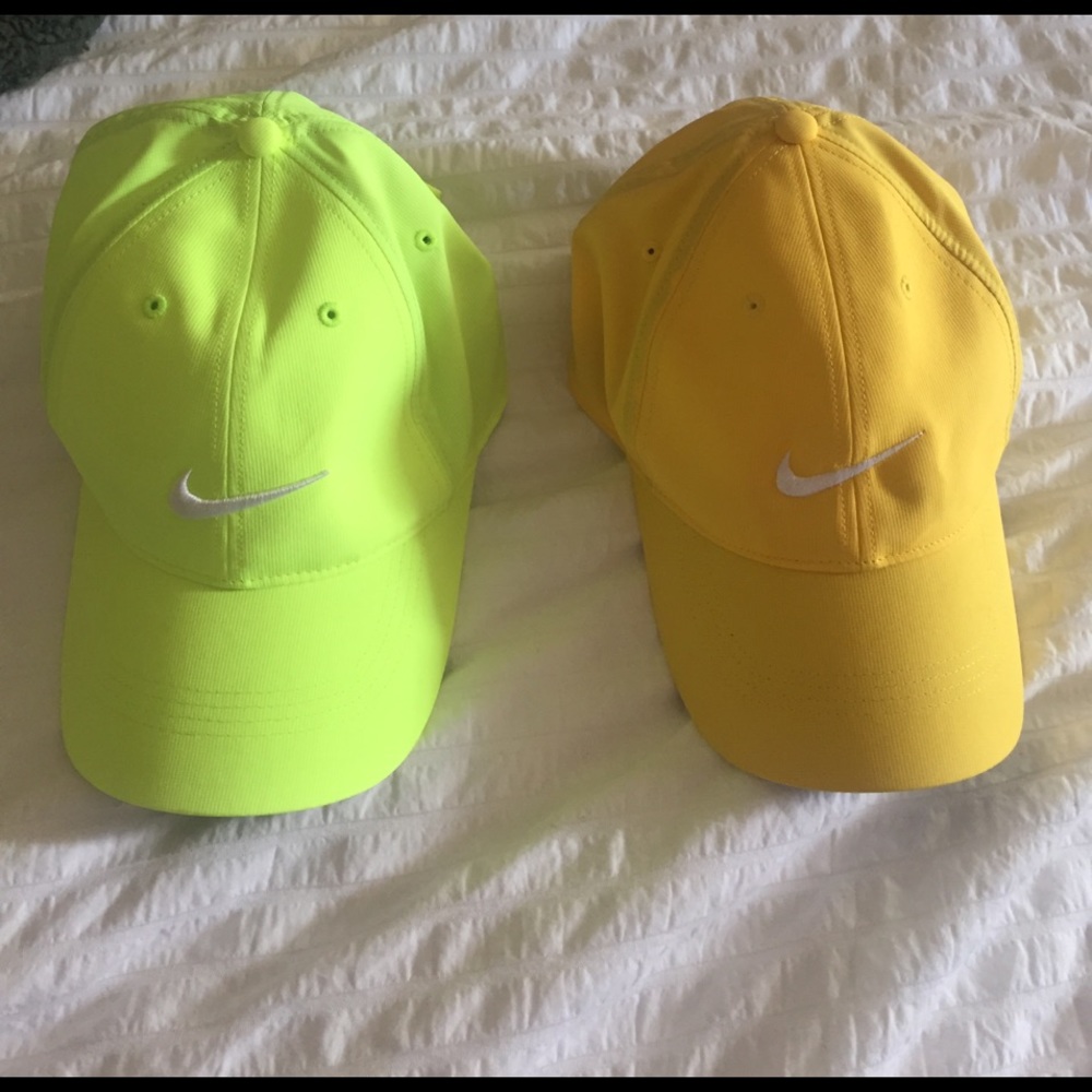 Two Nike Golf Hats