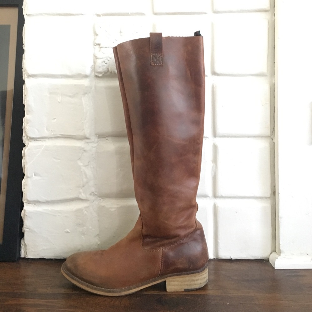 Perfectly weathered leather riding boots
