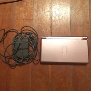 Rose Gold Nintendo DS with charger